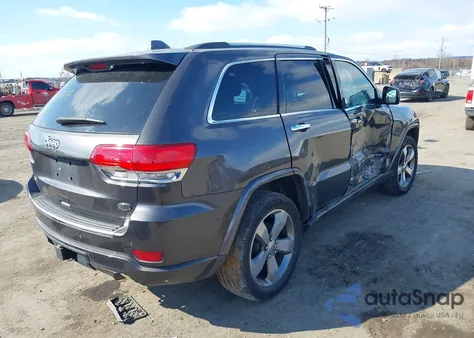 2014 Jeep Grand Cherokee Overland z USA, uszkodzony, nr VIN 1C4RJFCG6EC474380